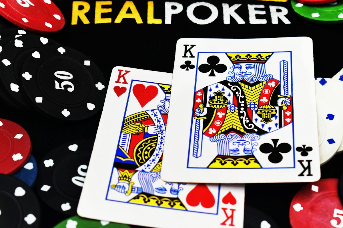 two King of club and heart on real poker